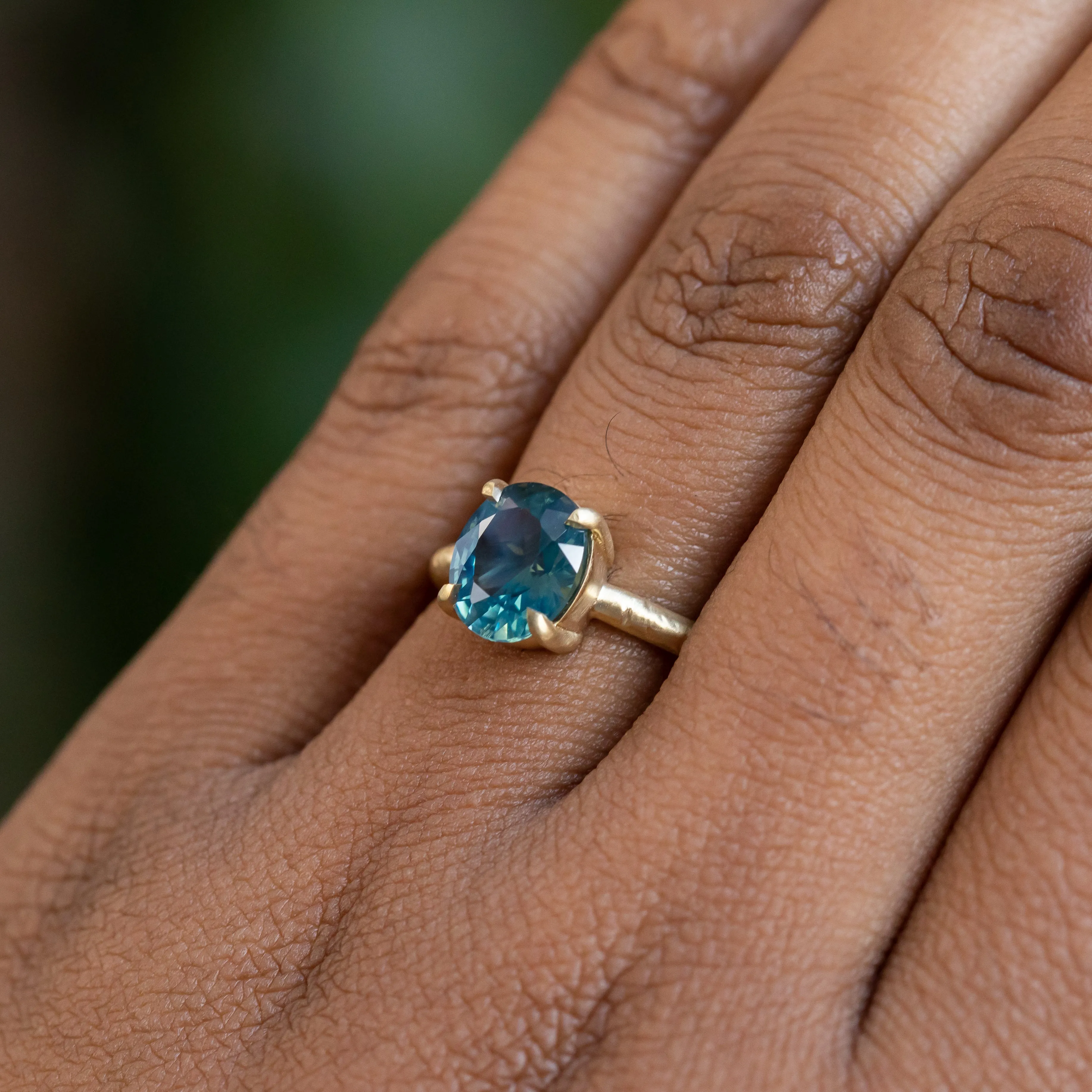 2.20ct Oval Silky Nigerian Sapphire Low Profile 4 Prong Evergreen Solitaire in 18k Yellow Gold