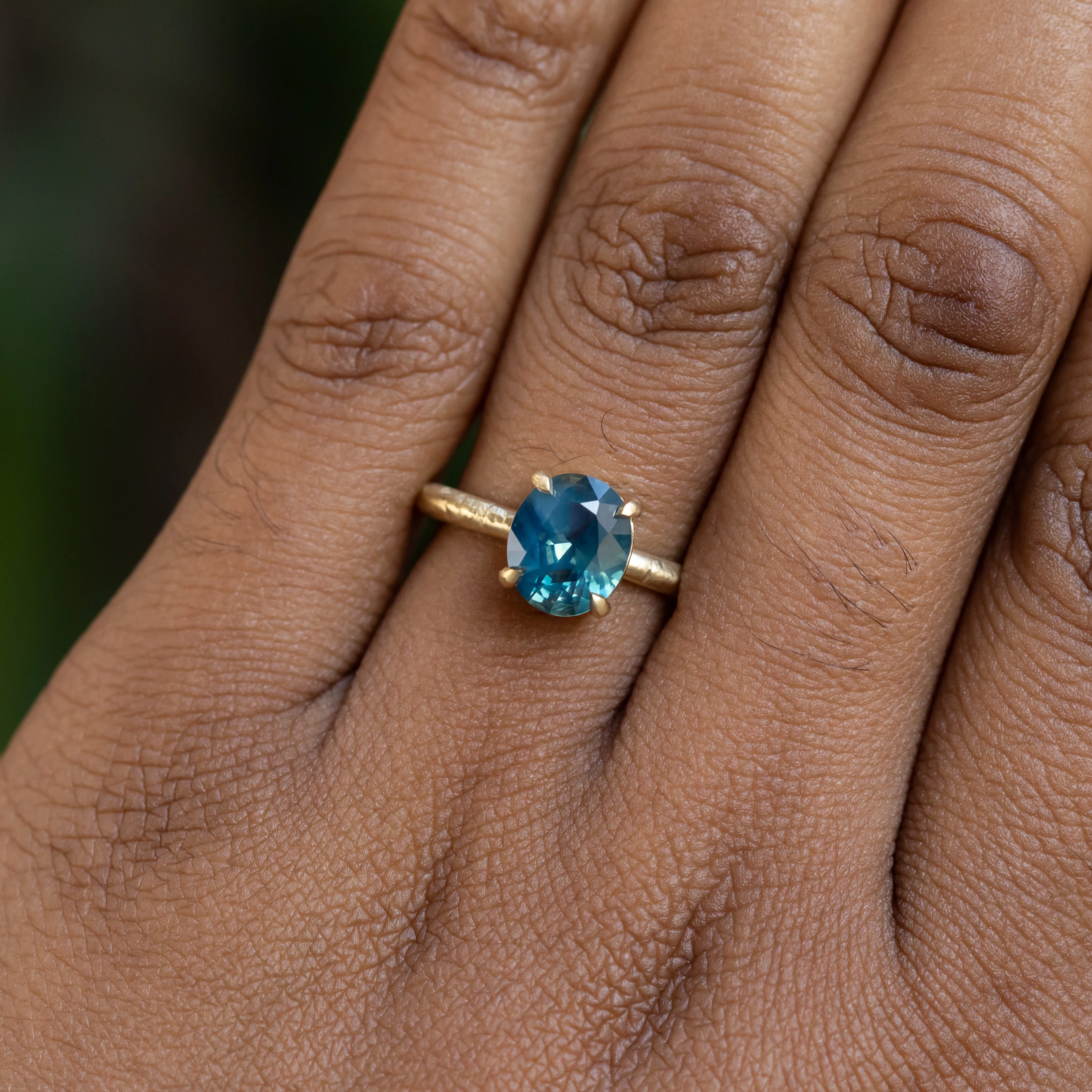 2.20ct Oval Silky Nigerian Sapphire Low Profile 4 Prong Evergreen Solitaire in 18k Yellow Gold