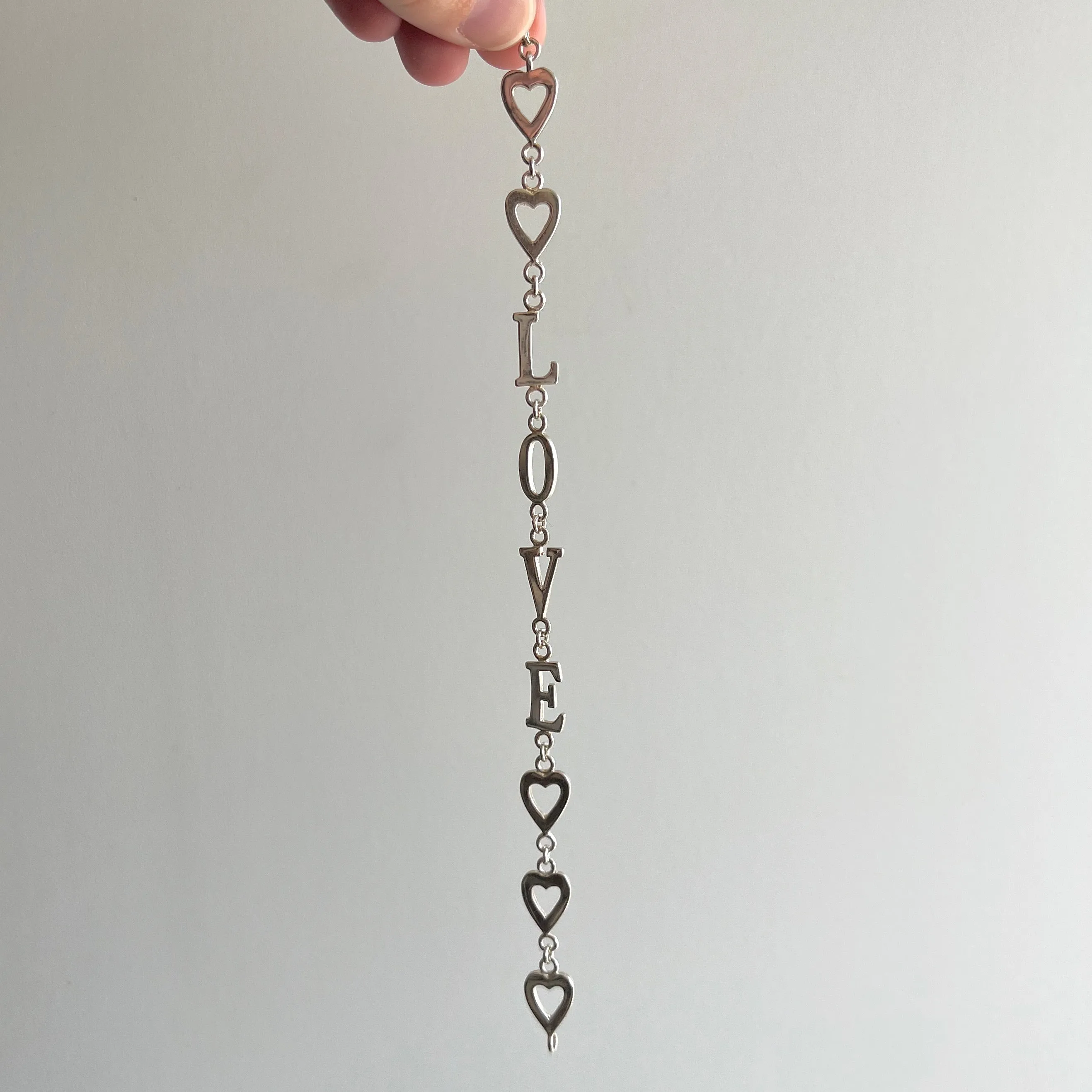 P R E - L O V E D // LOVE / sterling silver hearts and LOVE link bracelet / 7.5